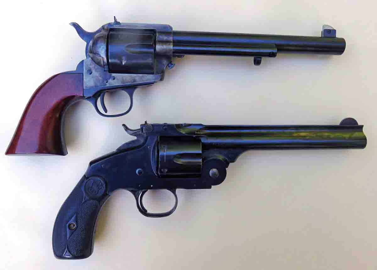 The two revolvers with 1880s-style target sights are the Flattop Colt-style and the S&W New Model #3 Frontier Target.